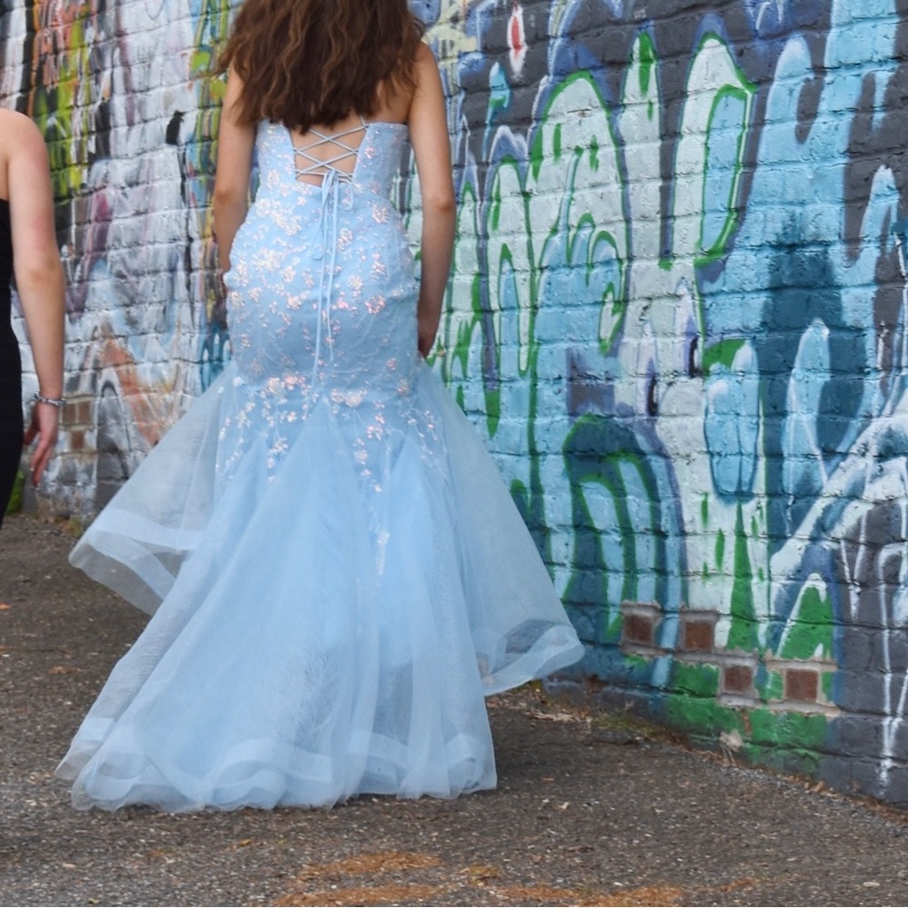 Worn once for prom night and dry cleaned immediately afterwards. Great condition